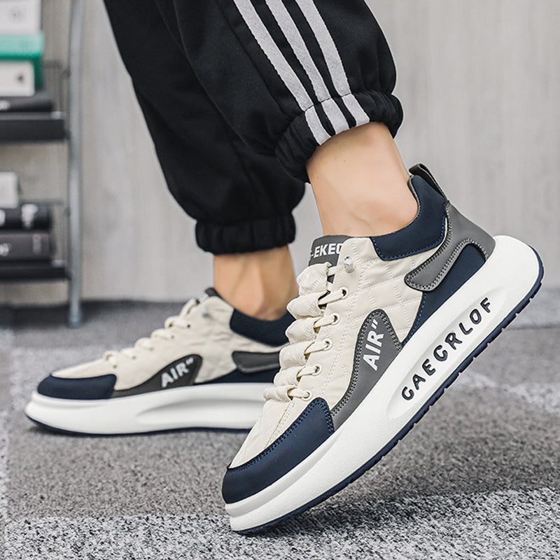 "Herr Sneakers i duntyg med tjock sula, elegant design, slitstark och bekväm, perfekt för sport och vardag."