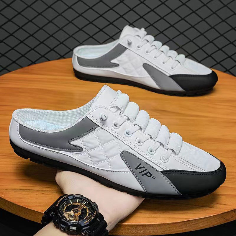 "Herr sneakers i syntetskinn med öppen häl, rund tå och slip-on design, perfekta för vardaglig användning."
