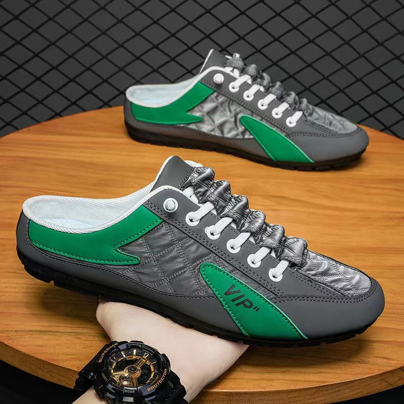 "Herr sneakers i syntetskinn med öppen häl, rund tå och slip-on design, perfekta för vardaglig användning."