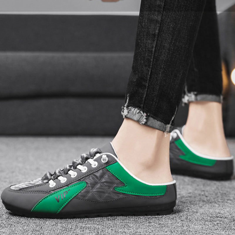 "Herr sneakers i syntetskinn med öppen häl, rund tå och slip-on design, perfekta för vardaglig användning."