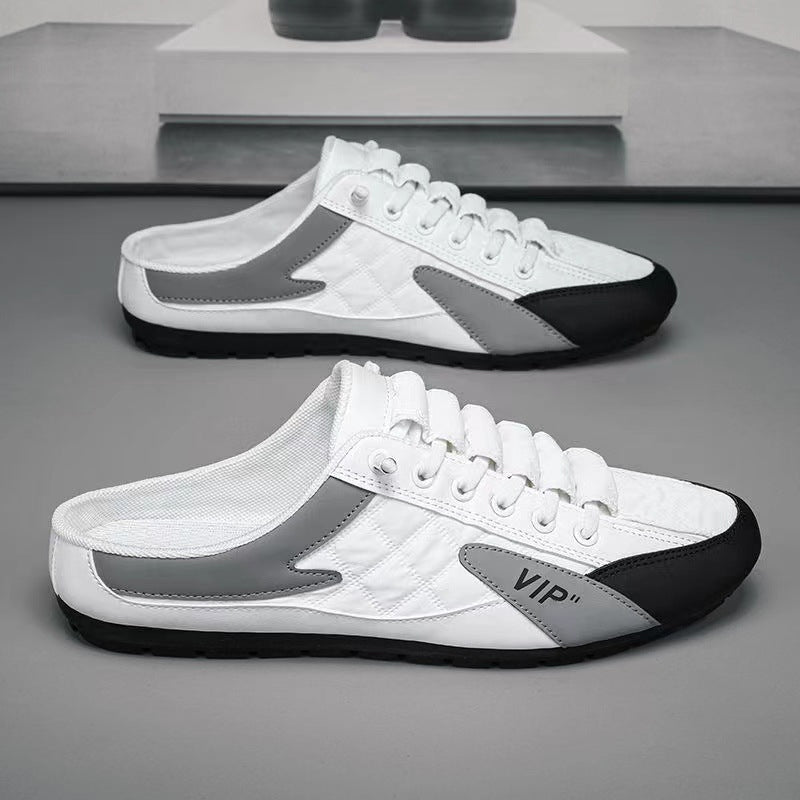 "Herr sneakers i syntetskinn med öppen häl, rund tå och slip-on design, perfekta för vardaglig användning."