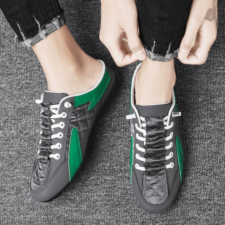 "Herr sneakers i syntetskinn med öppen häl, rund tå och slip-on design, perfekta för vardaglig användning."