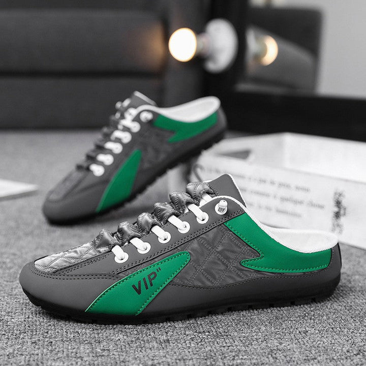 "Herr sneakers i syntetskinn med öppen häl, rund tå och slip-on design, perfekta för vardaglig användning."