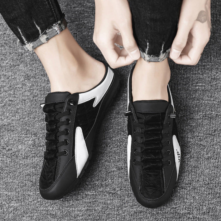"Herr sportiga slip-on skor i ventilerande mesh med rund tå och platt häl, erbjuder stil och bekvämlighet."