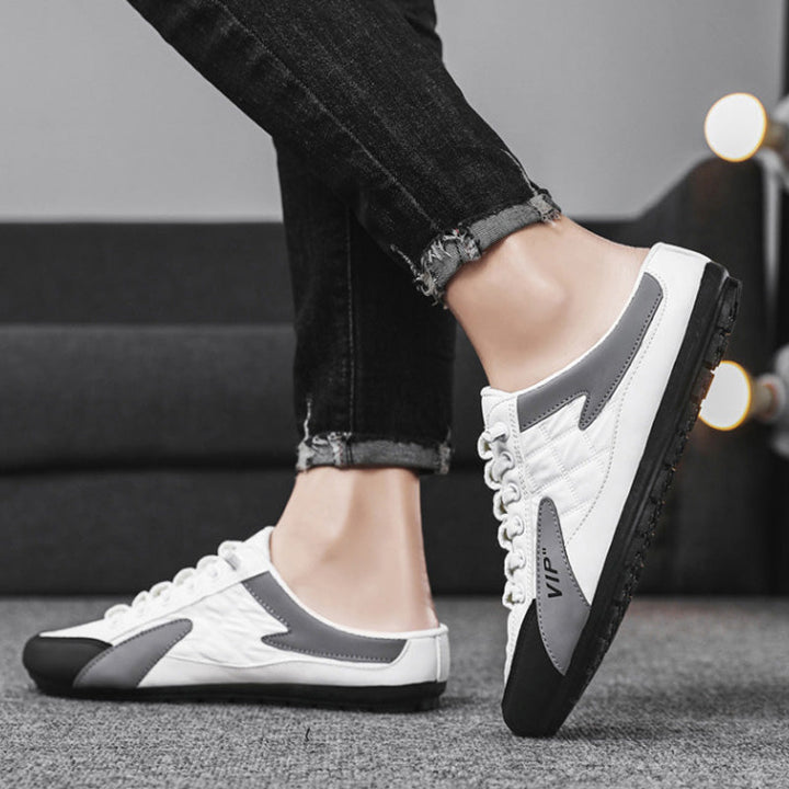 "Herr sportiga slip-on skor i ventilerande mesh med rund tå och platt häl, erbjuder stil och bekvämlighet."