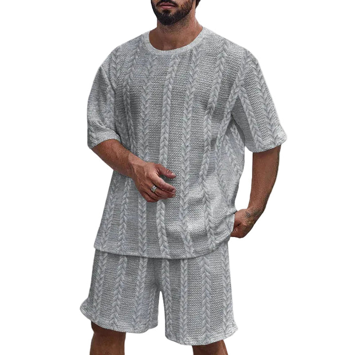 Herr urban träningsset i svart med t-shirt och shorts för komfortabel fritid.