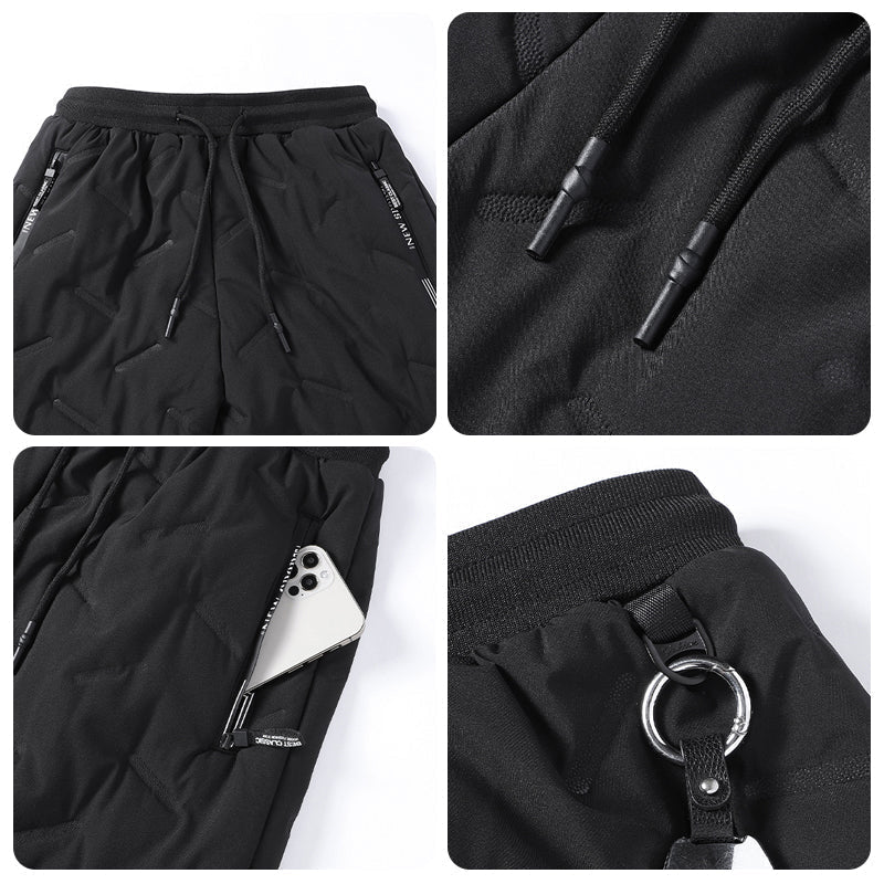 "Herr vinterfleece byxor med resårband, platt benöppning, mörk färg, varm fleece, stilren look för kalla dagar."
