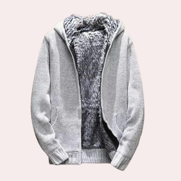 Herr vinterstickad tröja med huva i varmt material för stil och komfort. Perfekt höstmode.
