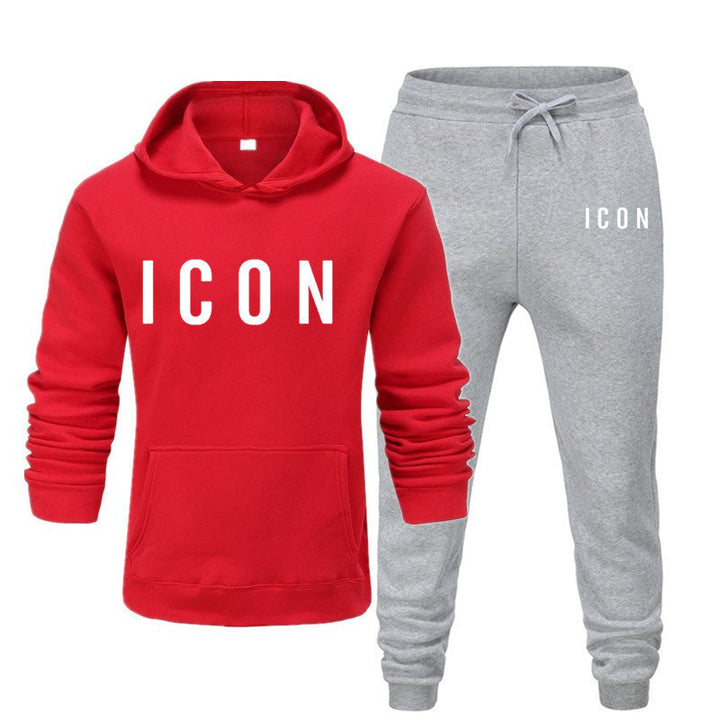 Grått matchande set för herr, med skön hoodie och joggingbyxor. Idealisk för sportigt eller avslappnat mode.