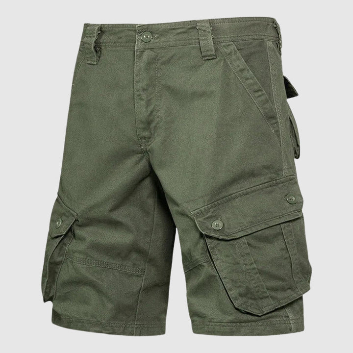 Närbild på tyget i slittåliga herr cargoshorts, visar kvaliteten för utomhusaktiviteter.