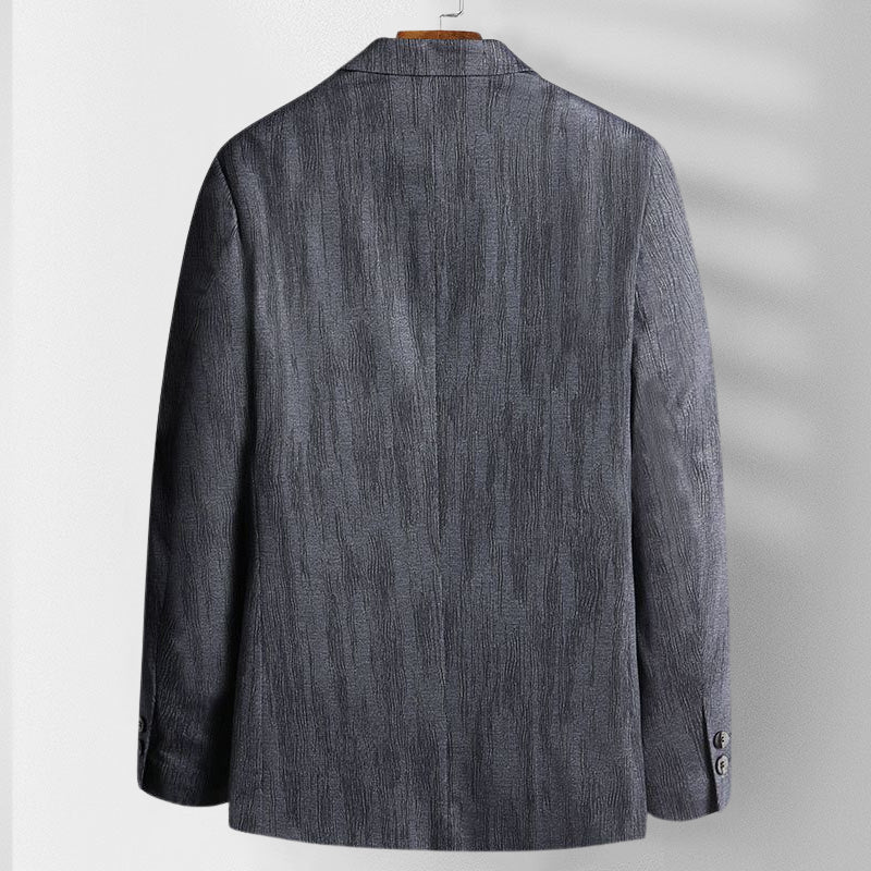 Formell herrblazer för festkläder och affärskläder, med modern och stilren design.