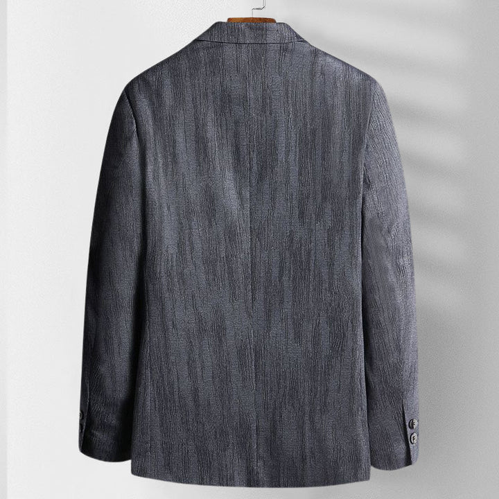 Formell herrblazer för festkläder och affärskläder, med modern och stilren design.