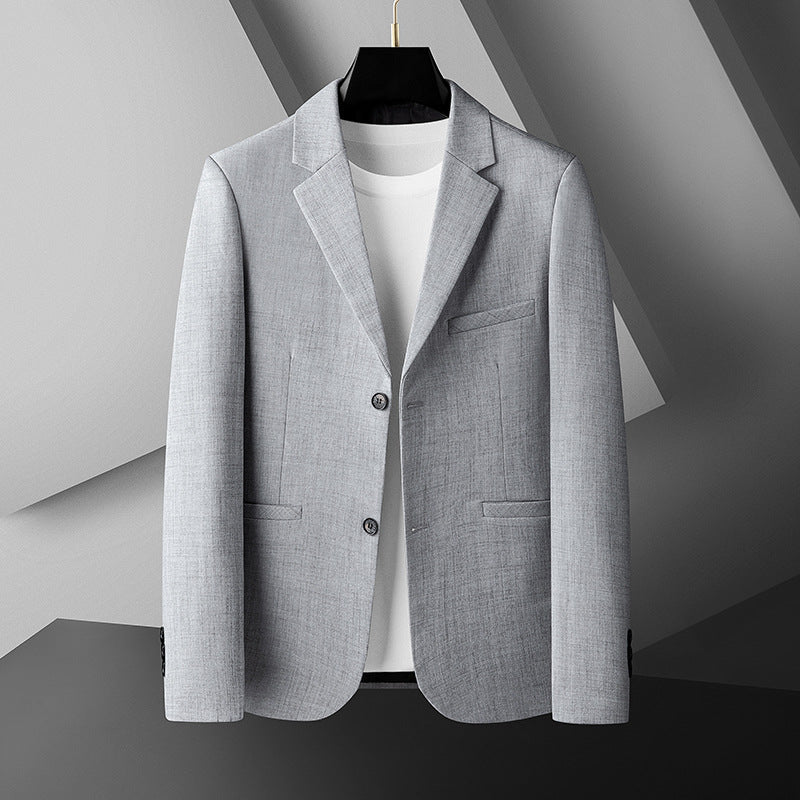 Grå herrblazer med elegant krage, modern passform som passar både fritidsstil och kontoret.