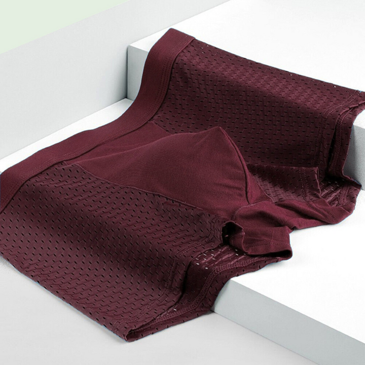 Herrboxershorts med bekväm midjeband och ergonomisk passform. Andningsbara underkläder för ultimat vardagskomfort.