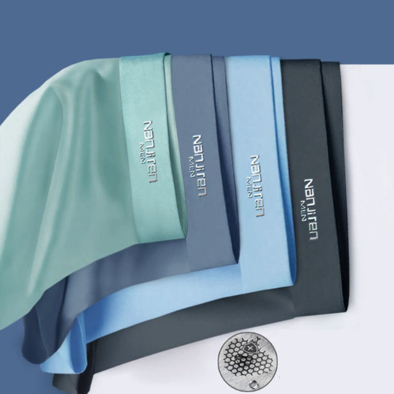 Detaljbild på linningen av herrboxershorts, 'Komfort'-logga, mjuka & stretchiga för optimal passform.