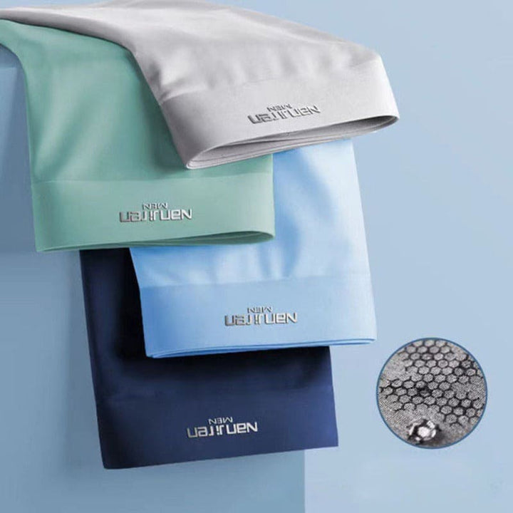 Produktfoto: Utvikta herrboxershorts, 4-pack, visar mjukt material och klassisk design.