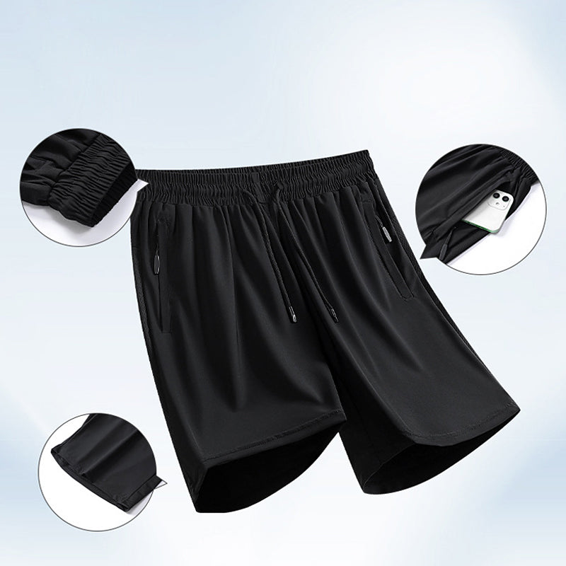 "Herrens sommar stretchiga sportshorts i grått, elastisk midja, praktiska fickor, perfekt för träning och fritid."