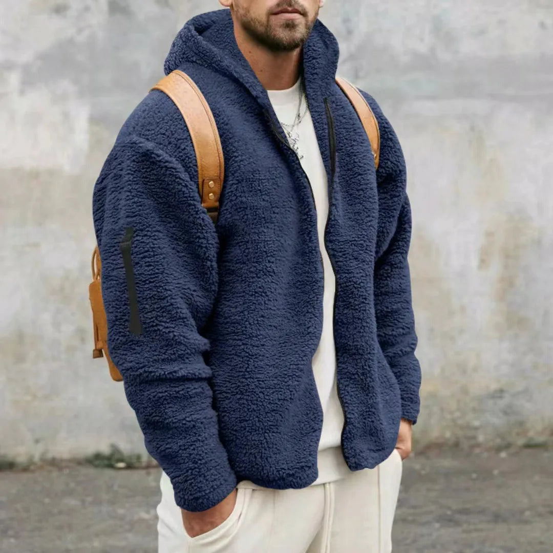 Modern herrjacka med huva och hel dragkedja. Värmande ytterplagg, perfekt för herrmode i kyla.