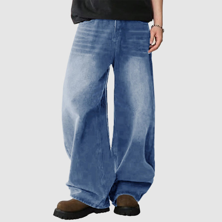 Grå baggy jeans för män med breda ben, idealiska för vardagsbruk och street style.