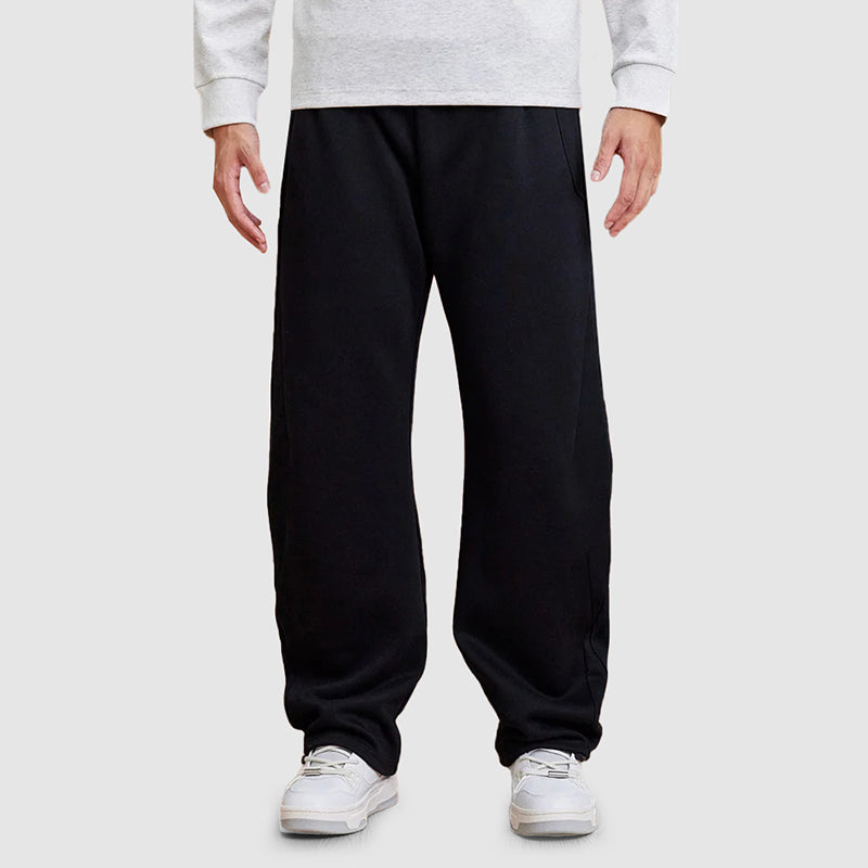 Bekväma raka ben-joggers för män, i svart tyg, idealiska för mode och fritidsaktiviteter. Herrbyxor.