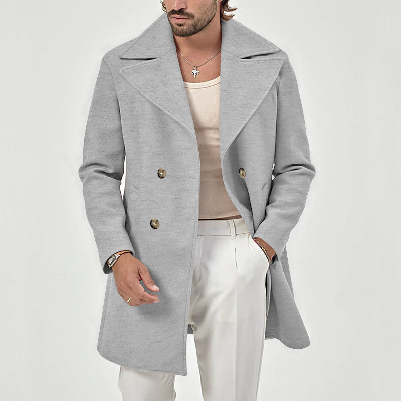 Detaljbild på formell herrkappa i ullblandning, med tydlig struktur i tyget. Perfekt höstmode.
