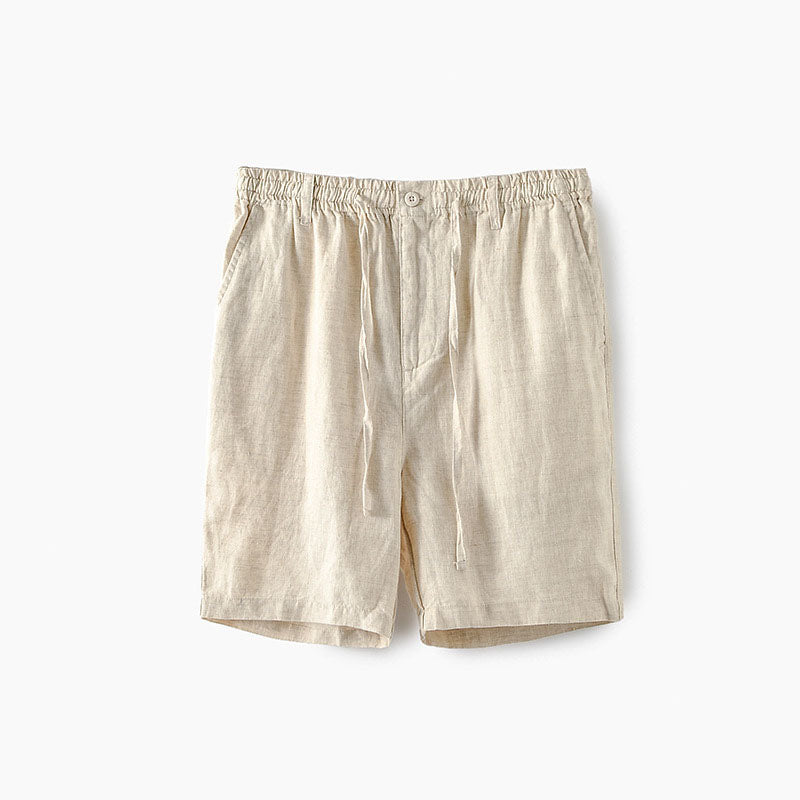 Marinblå herrlinneshorts med resår i midjan, ett mångsidigt plagg för varma dagar.