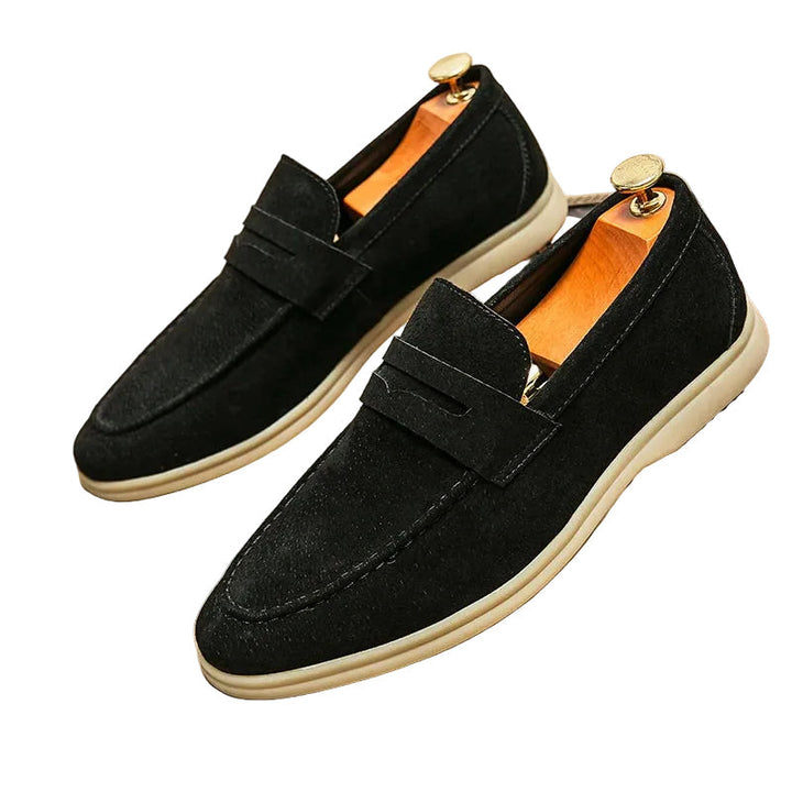 Herrloafers i brunt skinn, stilren design, eleganta vardagsskor med komfort.