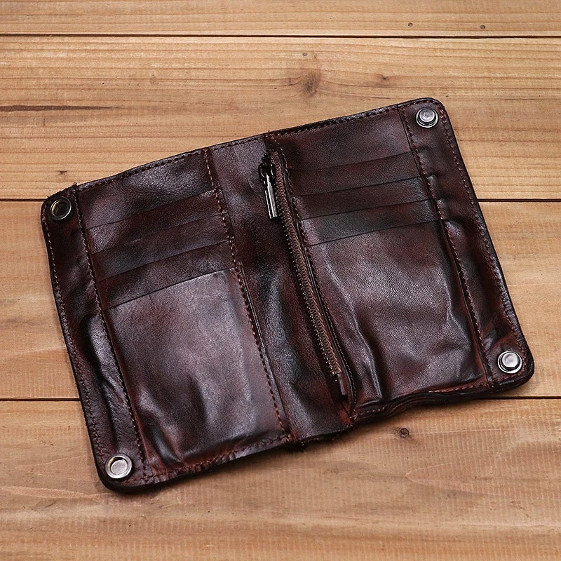 "Herrplånbok i retro stil av läder, många kortplatser, färger: svart, gul, ljusbrun, mörkbrun, elegant och tidlös."