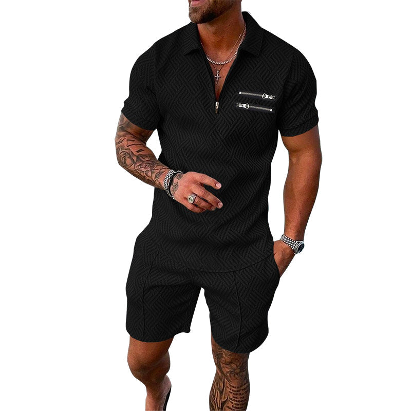 "Herrset med tryckt polo T-shirt och shorts, casual sommaroutfit, livliga mönster, perfekt för avslappnade stunder."