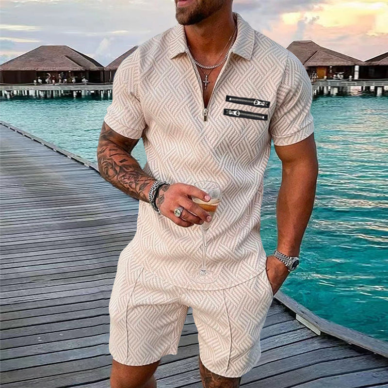 "Herrset med tryckt polo T-shirt och shorts, casual sommaroutfit, livliga mönster, perfekt för avslappnade stunder."