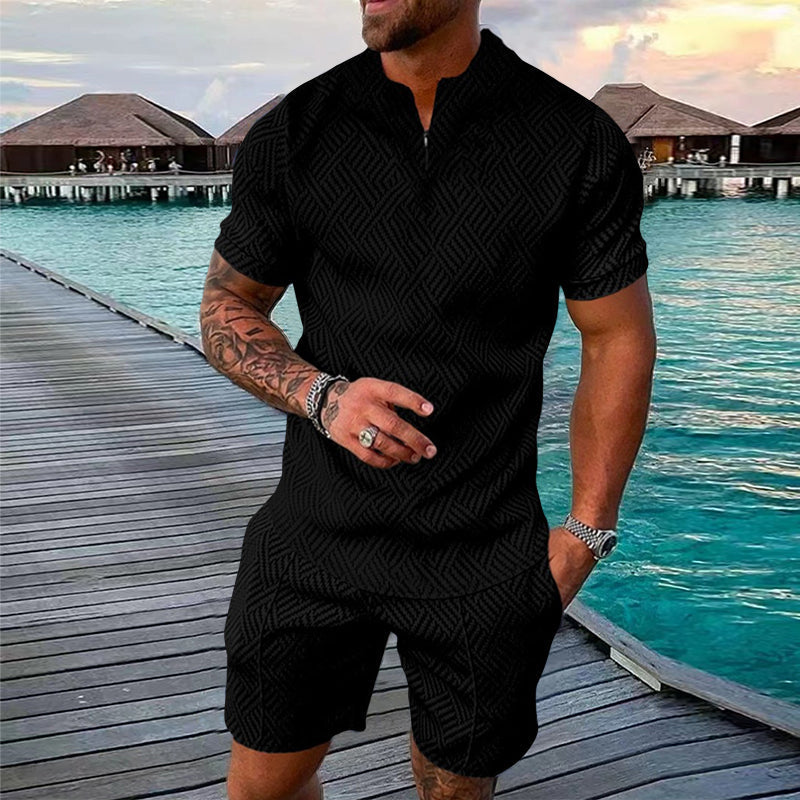 "Herrset med tryckt polo T-shirt och shorts, casual sommaroutfit, livliga mönster, perfekt för avslappnade stunder."