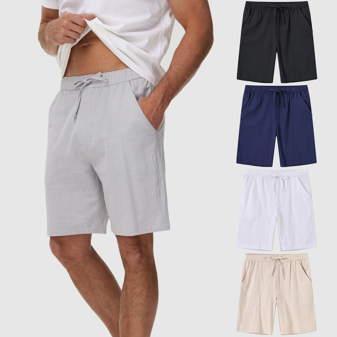 Närbild av herrshorts i linne, medelhög midja, perfekt för casual beachwear.