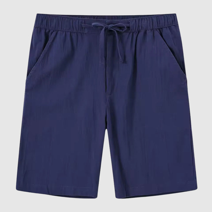 Detaljerade bilder av linneshorts herr, medelhög midja, perfekt för casual stil.