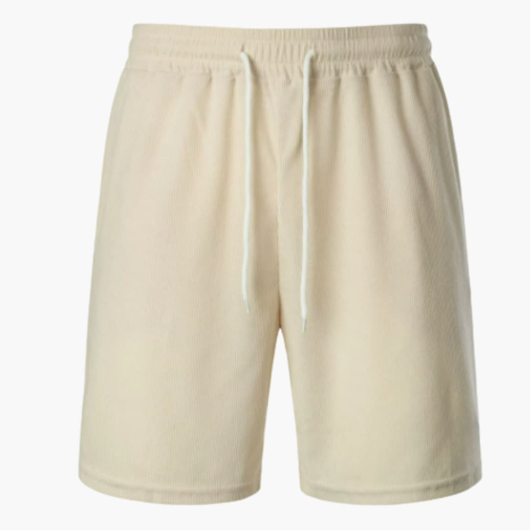 Mjuka, ribbade herrshorts med dragsko för maximal komfort. Perfekta sommarshorts för aktiva dagar.
