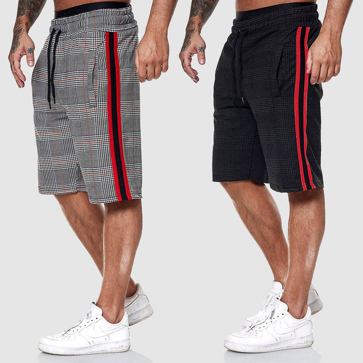 Mångsidiga herrshorts med rutigt mönster och dragsko, perfekta för varma dagar.