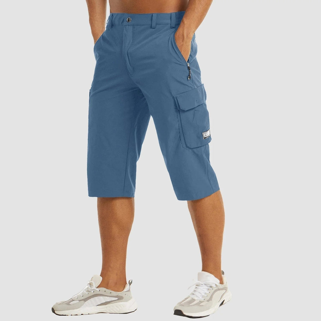 Lätta och bekväma herrshorts, snabbtorkande cargomodel, optimala för sommar och resor.