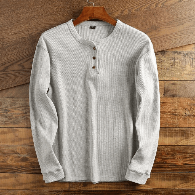 Långärmad herrskjorta med bekväm våffelstruktur. En stilren Henley för vardagsbruk.