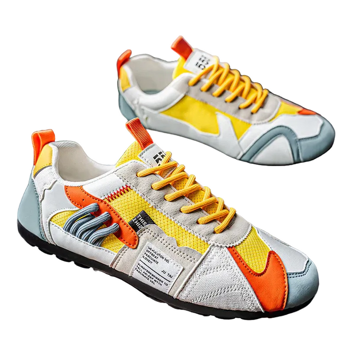 Herrskor i färgblockssneakers med skiktad design, moderna och bekväma för vardagsbruk.