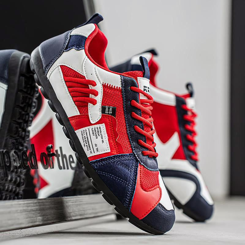 Moderna herrskor: Färgblocksneakers med trendig skiktad design, perfekta för modeinriktade män.
