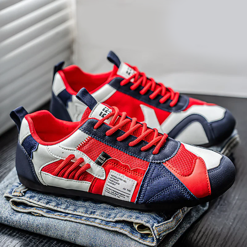Sportiga men bekväma herrskor: färgblockssneakers med unik skiktad design och snörning.