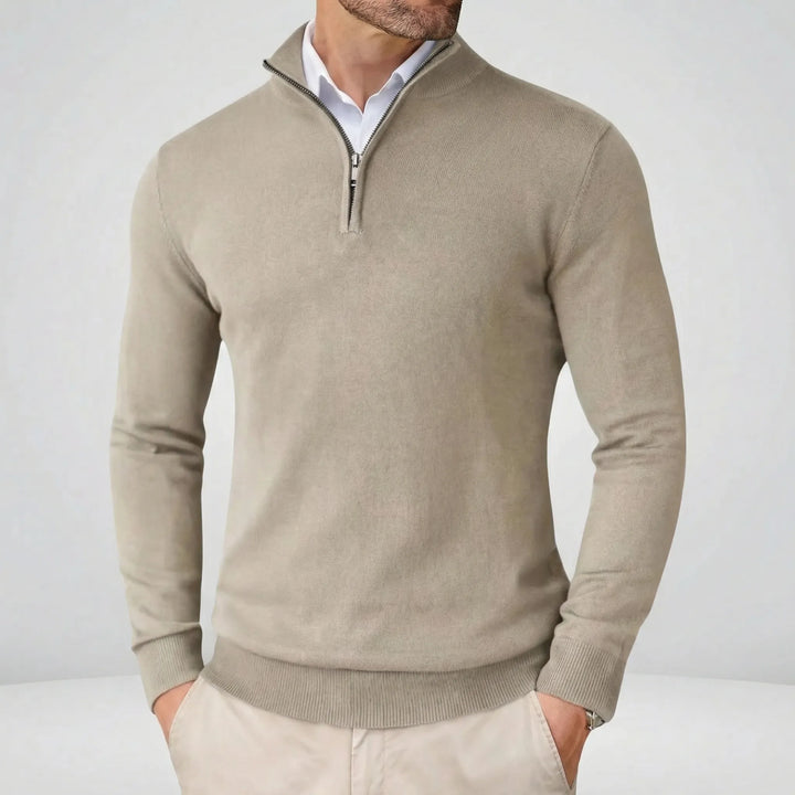 Herrtröja med halvdragkedja i modern passform. Långärmad pullover som kombinerar komfort och elegans.