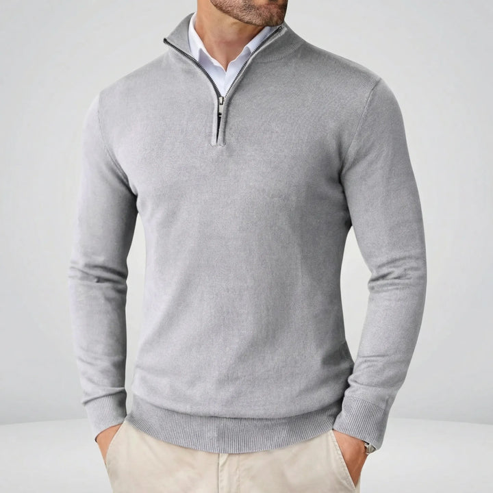 Högkvalitativ herrtröja med halvdragkedja. Långärmad pullover som erbjuder stil och komfort till vardags.