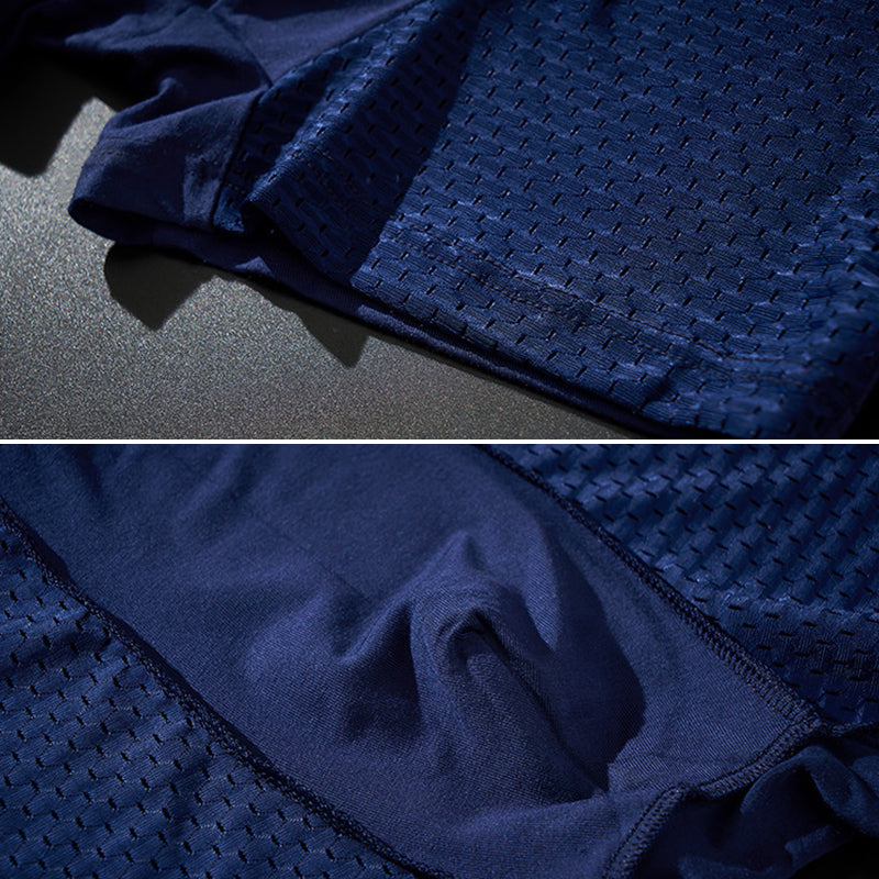 "Herrunderkläder med andningsfunktion, grå boxers i mjukt material, mellanhög midja för optimal komfort och passform."