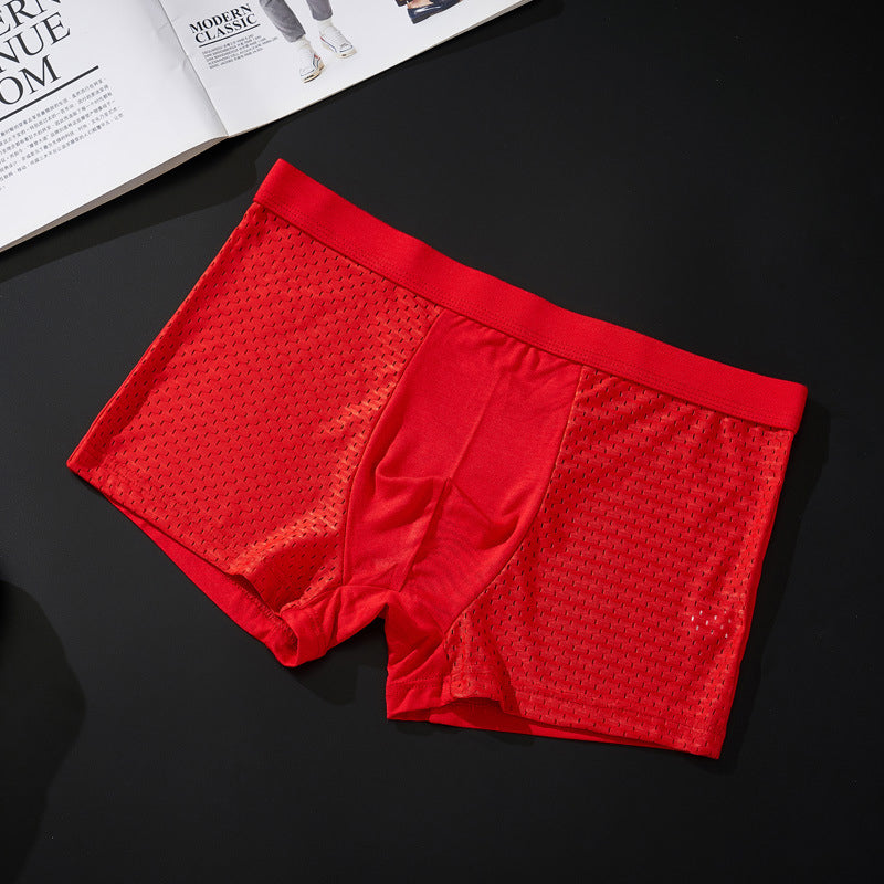"Herrunderkläder med andningsfunktion, grå boxers i mjukt material, mellanhög midja för optimal komfort och passform."
