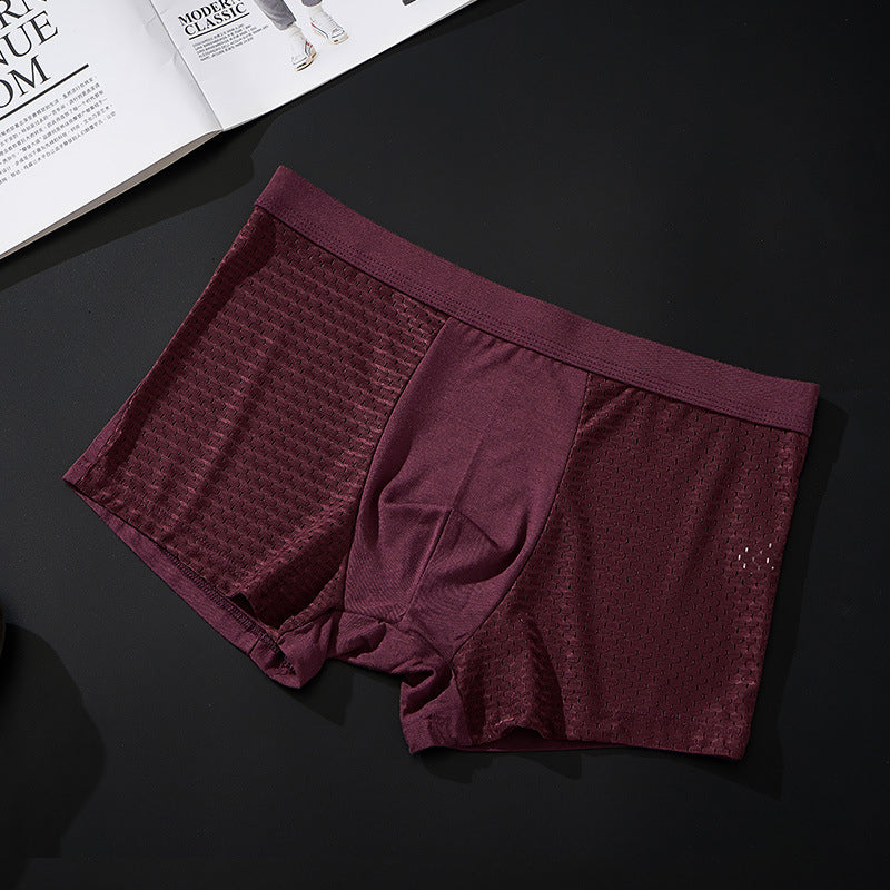 "Herrunderkläder med andningsfunktion, grå boxers i mjukt material, mellanhög midja för optimal komfort och passform."