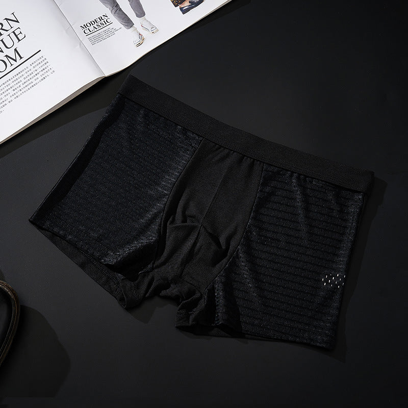 "Herrunderkläder med andningsfunktion, grå boxers i mjukt material, mellanhög midja för optimal komfort och passform."