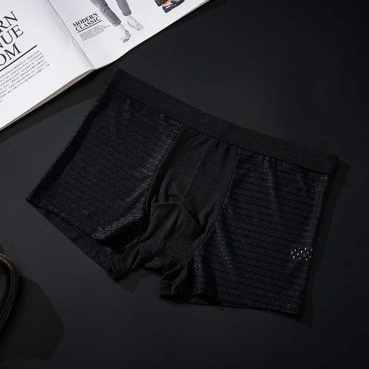 "Herrunderkläder med andningsfunktion, grå boxers i mjukt material, mellanhög midja för optimal komfort och passform."