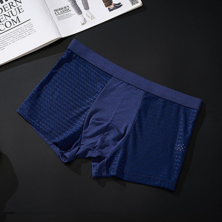 "Herrunderkläder med andningsfunktion, grå boxers i mjukt material, mellanhög midja för optimal komfort och passform."