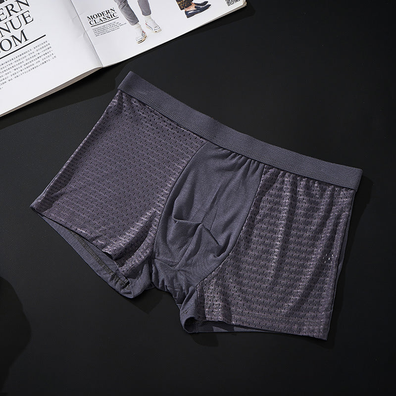 "Herrunderkläder med andningsfunktion, grå boxers i mjukt material, mellanhög midja för optimal komfort och passform."