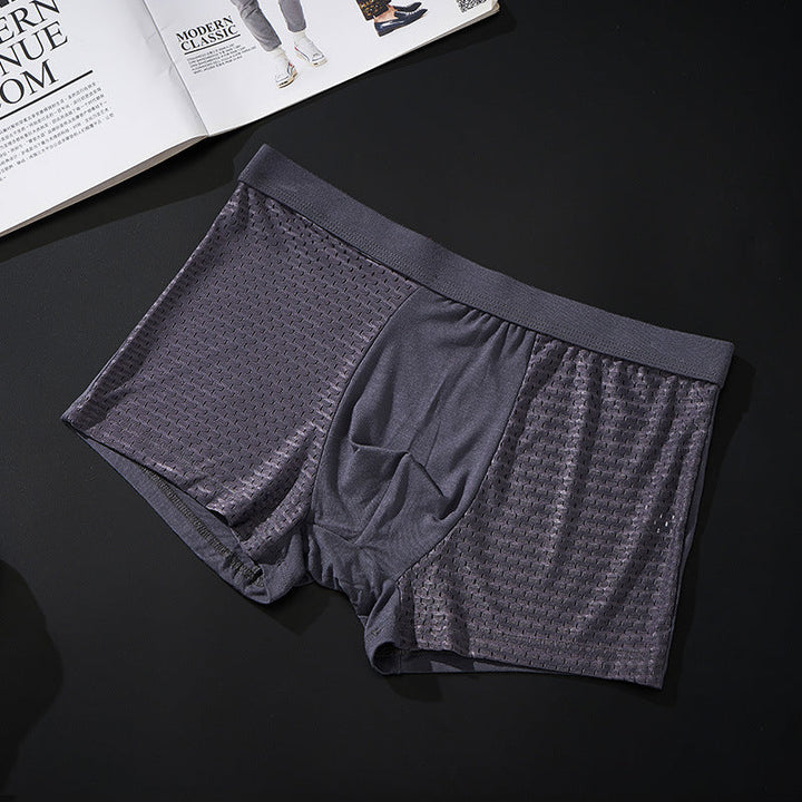 "Herrunderkläder med andningsfunktion, grå boxers i mjukt material, mellanhög midja för optimal komfort och passform."